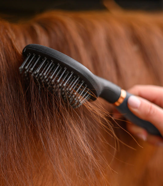 Brosse à longs poils avec poignée gel, noir-or rose